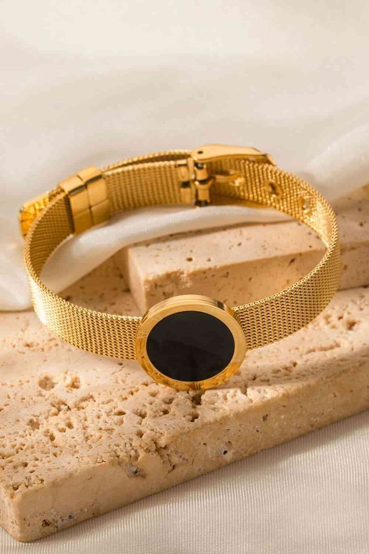 Gold Buckle Bracelet With A Black Disc